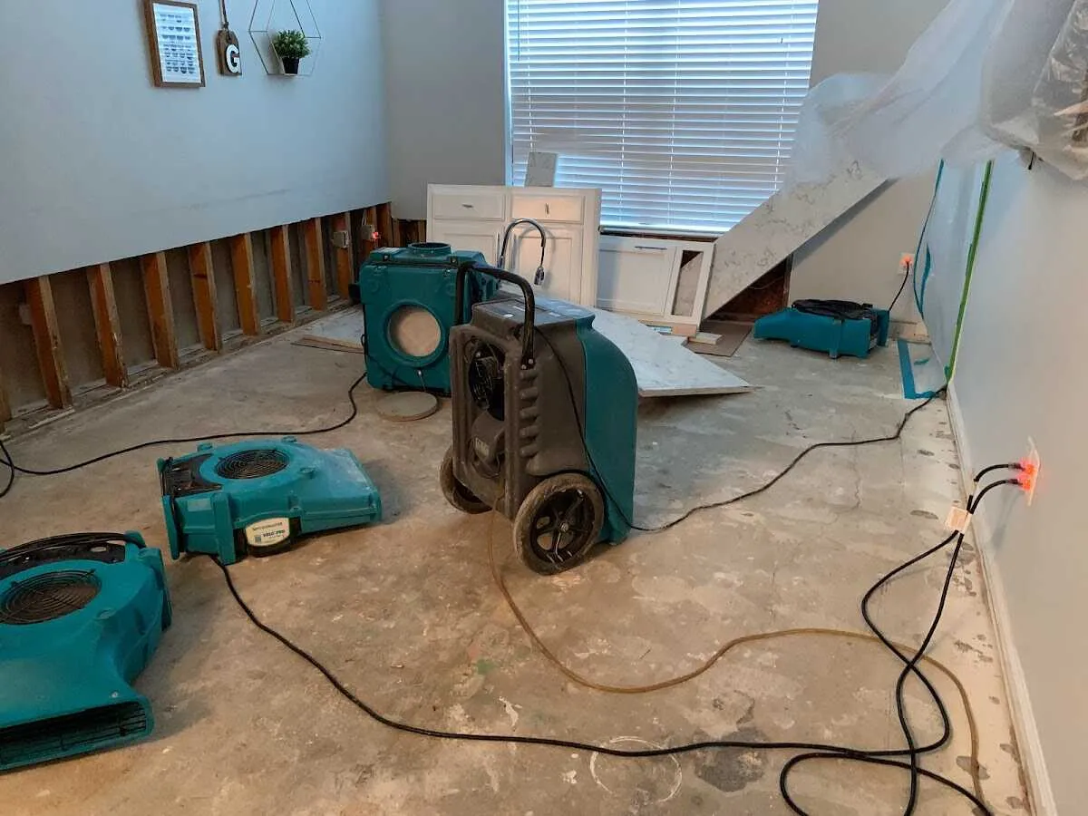 Dehumidifier in flood-cut room for Water Extraction & Removal in Gray